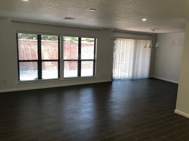 Dining area and private patio - 9009 N May Ave