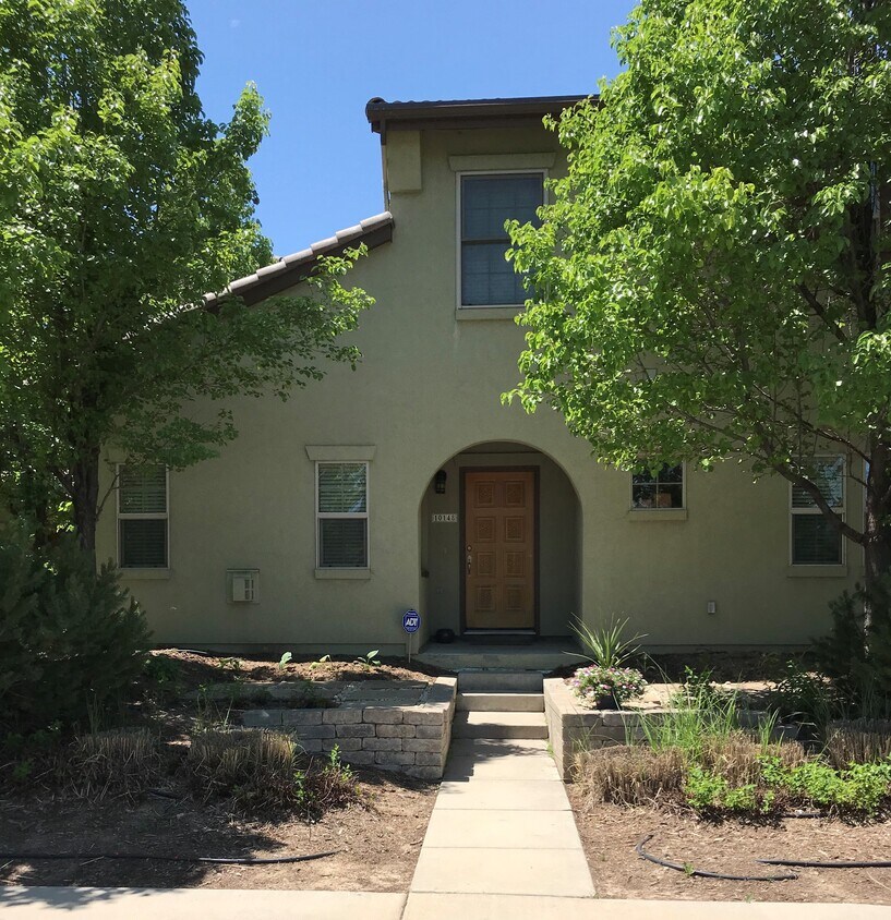 Street view of townhome - 10148 E 29th Dr