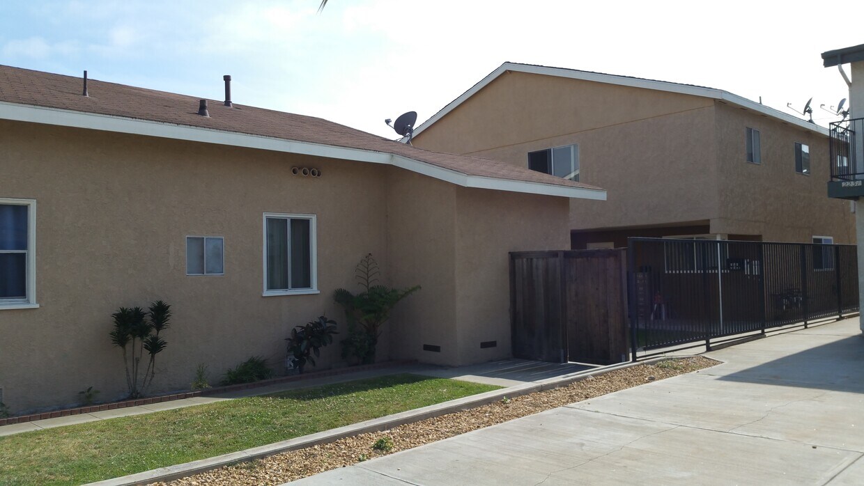 Apt A is upstairs behind this house - 2305 Cabrillo Ave