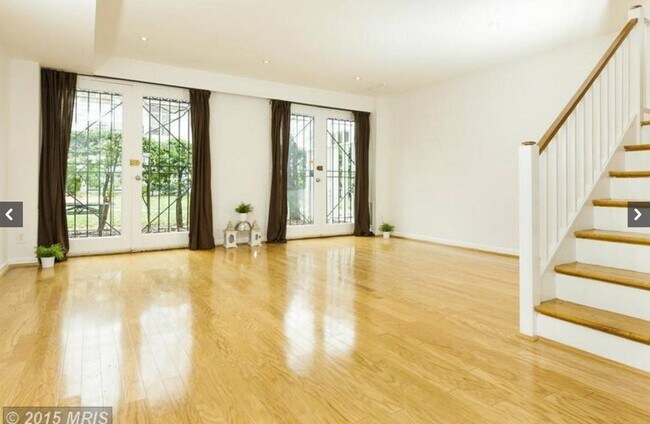 Living Room and Doors to Outdoor Patio - 242 G St SW