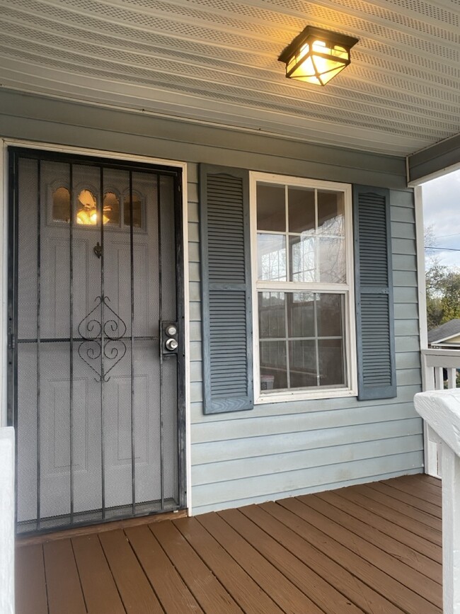 Front porch and Front Door. Room for 2 tables and chair - 1836 Glade St