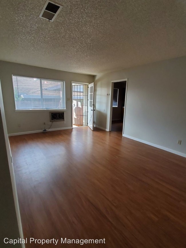 Building Photo - 6036-6038 Bourbon Dr