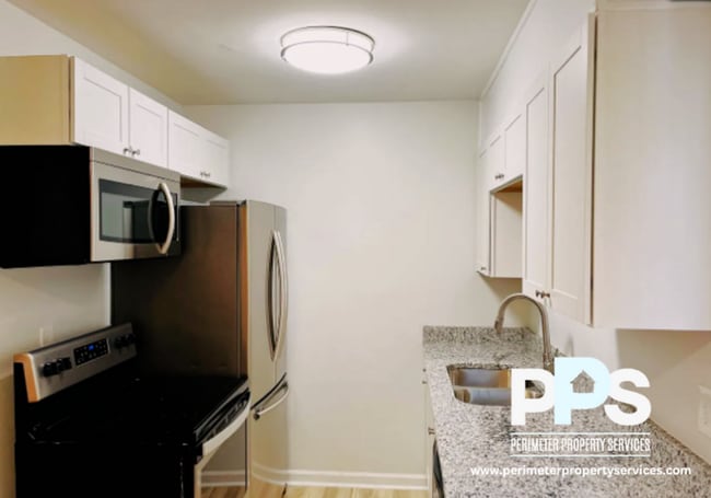 Foto del edificio - 6127-6129 E Fayetteville Dr