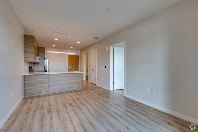 1BR, 1BA - 661SF - Living Room and Kitchen - Ratio