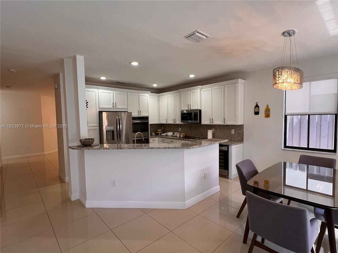 Photo - 8744 Northwest 99th Path, Doral, FL 33178 - 4 BR 3.5 BA Single-Family Home