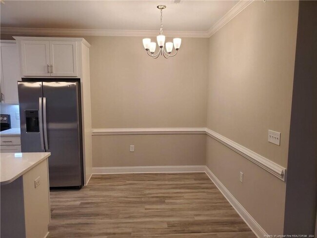 Building Photo - BRAND NEW CONDO!