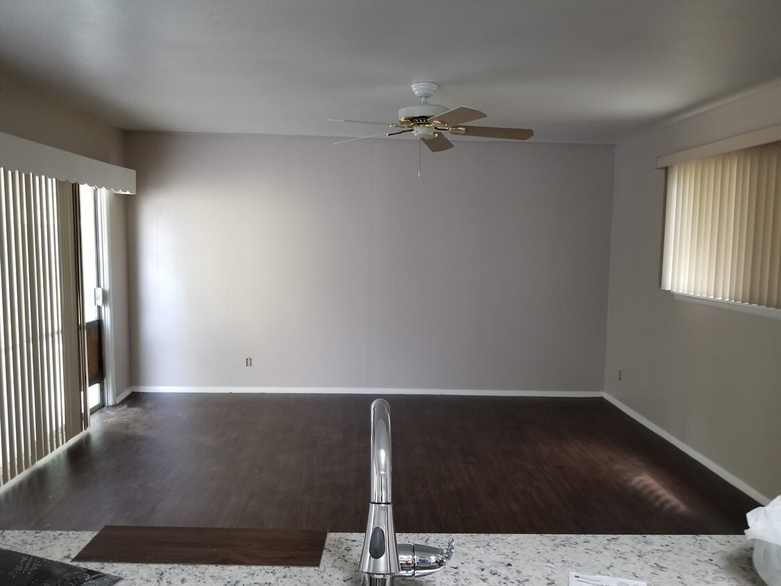 View into family room from the kitchen - 5570 Aspen Valley St