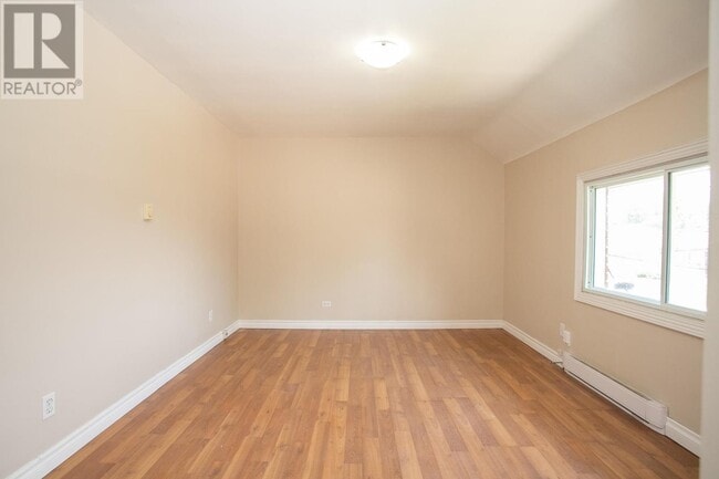 Building Photo - 2 Bedroom Upper-Level Unit – Parking & In-Unit Laundry – $1,549/month + Utilities