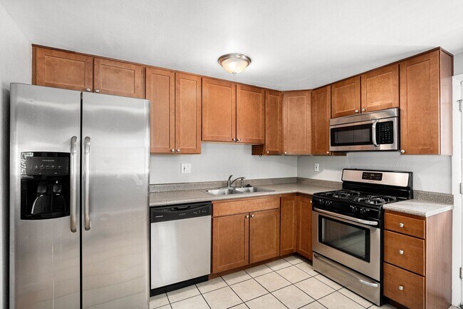 Building Photo - Spacious 4BR with bonus space and a 2 car ...