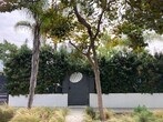 Front gate with privacy hedge - 1222 Poinsettia Dr