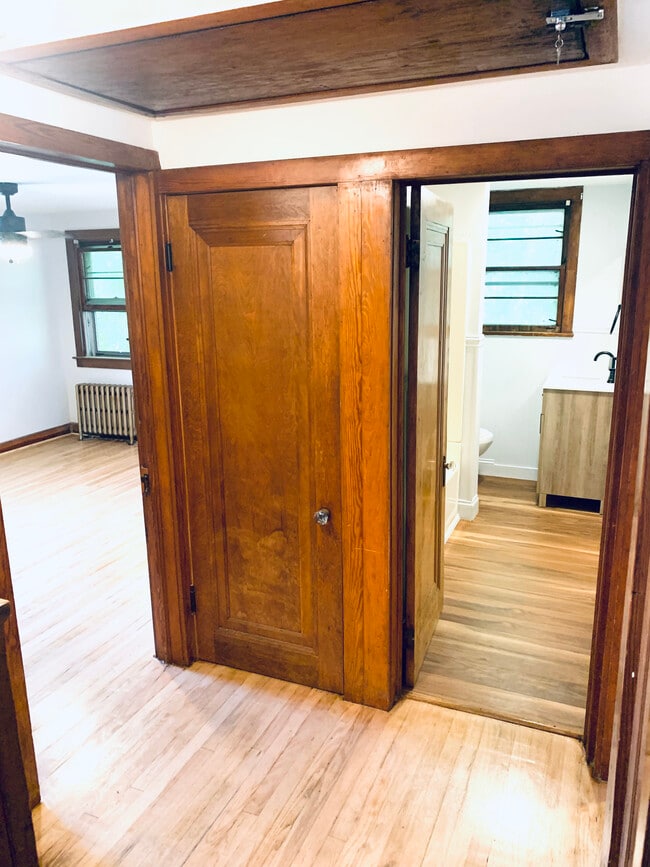 hallway w/ 3 closets - 202 Grove Ave