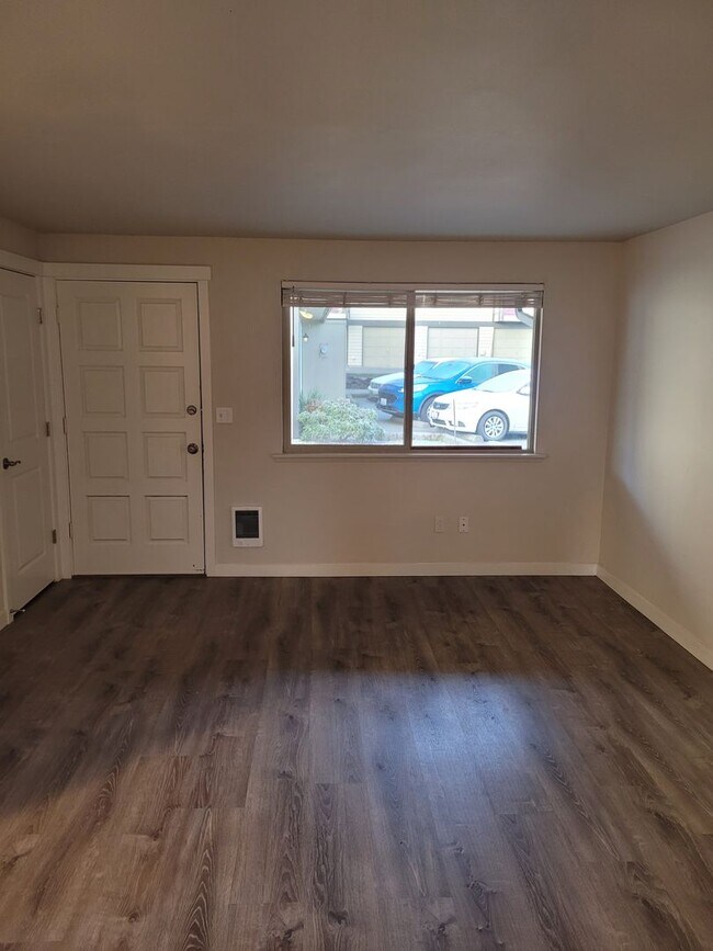 Building Photo - Updated side by side duplex with an attach...