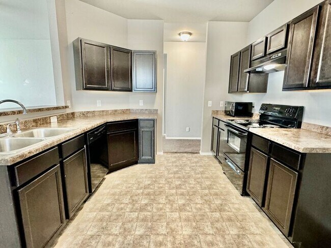 Foto del edificio - 6614 N 128th E Ave