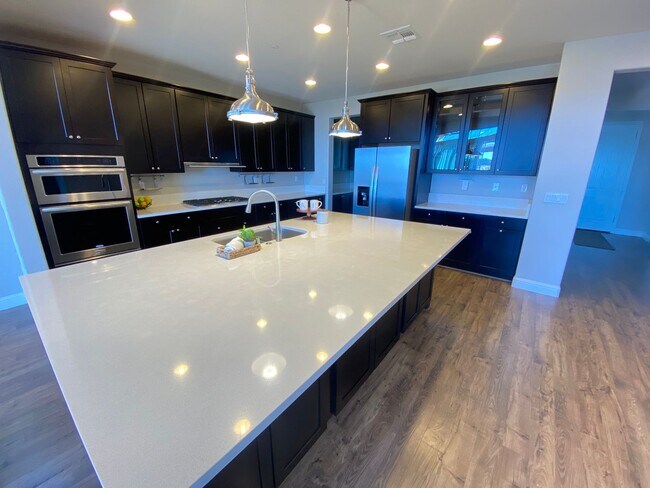 Building Photo - Advent -Immaculate Four Bedroom Home W/ Tw...