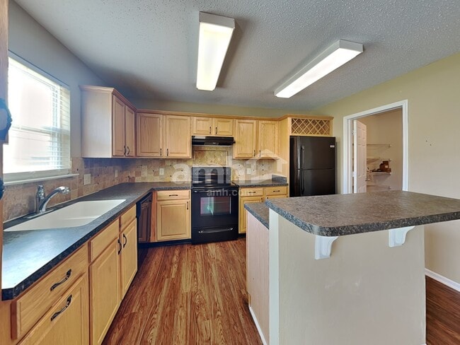 Building Photo - 6765 W Littleton Dr