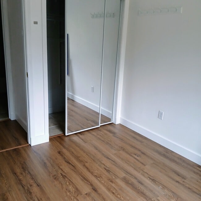 Bedroom with mirrored closet - 15812 451st Ave SE