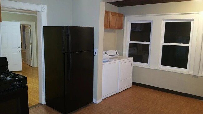 kitchen and laundry area - 2418 University Ave NE