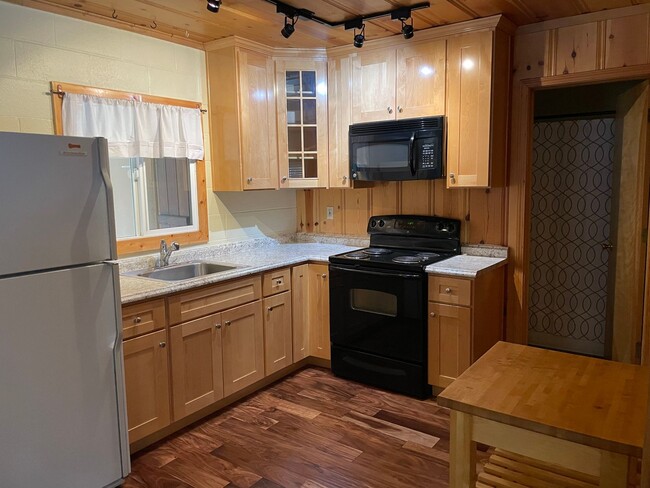 Building Photo - Upgraded and Cozy Al Tahoe Cabin - long te...