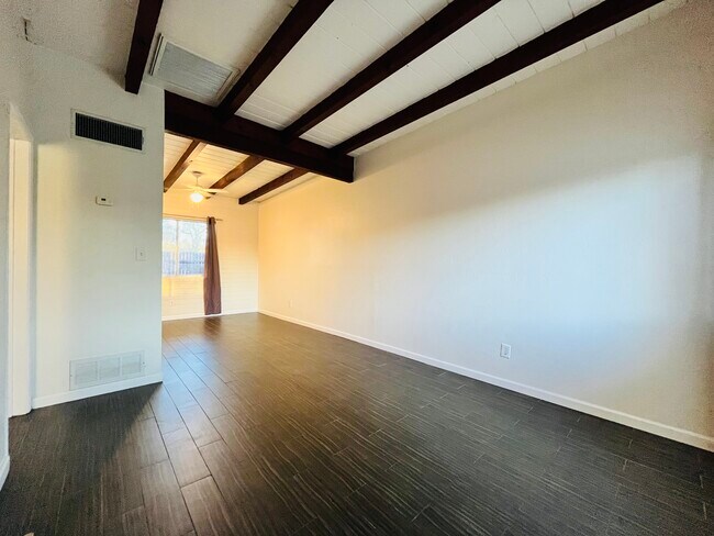 Living room and dining area - 612 E Drachman St