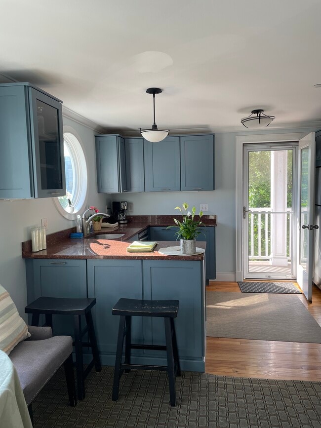 Kitchen newly painted cabinets/walls - 234 Eastern Promenade
