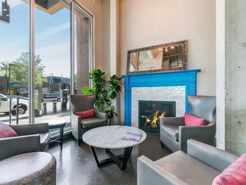 Lounge area with fireplace and seating.