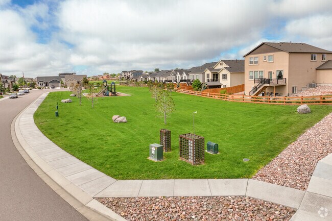 Community green spaces are just feet from the back doors of Cimarron Hills homes.
