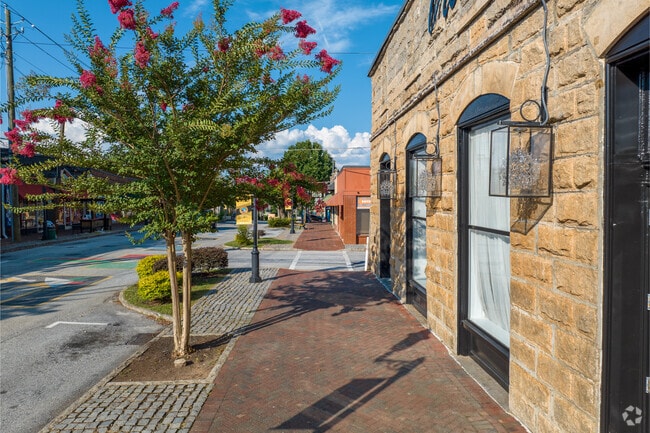Red brick paths add to Lithonia's charming downtown.