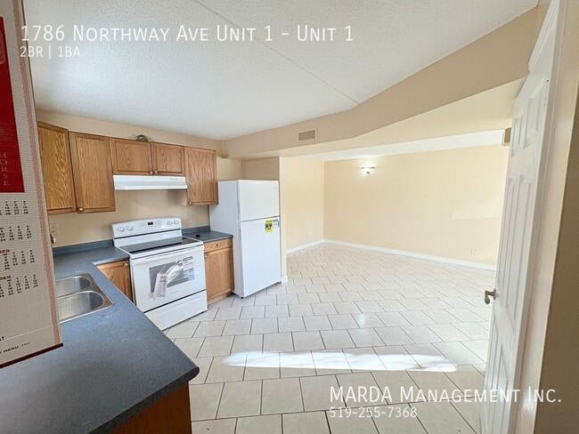 Building Photo - SPACIOUS 2 BED/1 BATH MODERN LOWER LEVEL SUITE! +HYDRO, GAS & WATER!