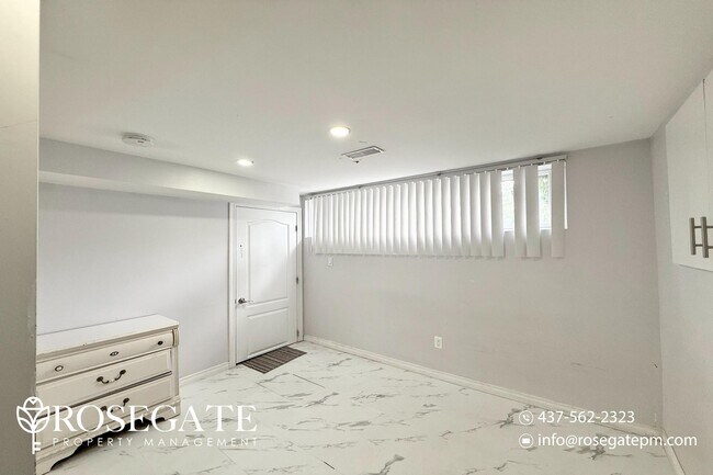 Photo du bâtiment - Affordable 1-Bedroom Basement Unit in Scar...