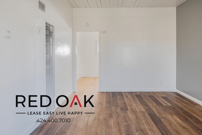 Foto del edificio - Bright and Spacious One-Bedroom with A/C, ...