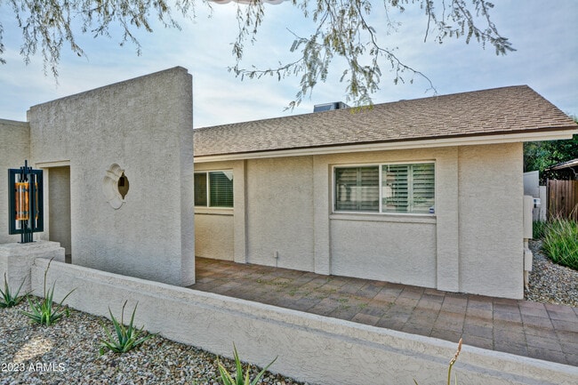 Building Photo - 6747 E Aire Libre Ln