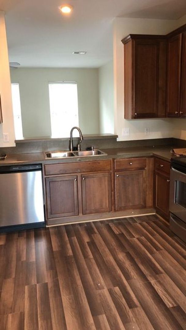 Building Photo - Beautiful Gated Townhome Community