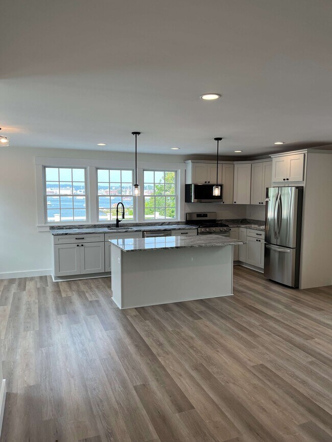 Open living with harbor views - 169 E Main St