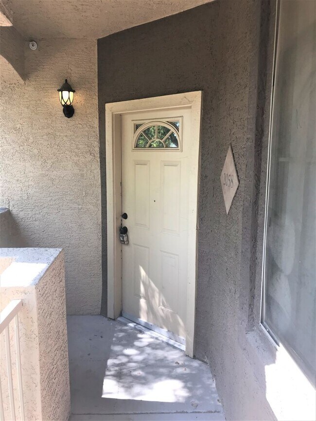 Building Photo - **SPECTACULAR - 2BEDROOM/2BATHROOM/1GARAGE/GATED CONDO (SOUTHERN & CRISMON)**