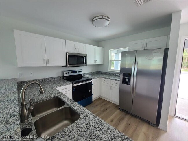 Building Photo - 6950 San Benito Dr