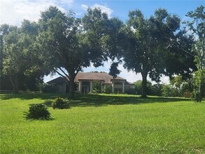 Building Photo - 15404 Thoroughbred Ln