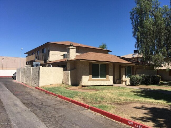 Photo - 2 BEDROOM 1 BATH UPSTIARS UNIT WITH BALCON... Townhome