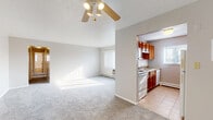 This 680 square foot single-story residence in Middleburg Heights, Ohio, offers a practical living space with three bedrooms and one bathroom. The home's efficient layout maximizes the available area, providing a comfortable living environment despite its compact size.

The kitchen is a standout feature, boasting warm wooden cabinetry and ample counter space. Natural light floods the room through a window, enhancing the sense of openness. The countertops appear to be a neutral-toned material, complementing the overall color scheme.

The bedrooms are modestly sized yet functional, each featuring carpeted floors and windows that allow natural light to brighten the spaces. Built-in closets with sliding wooden doors offer storage solutions in at least one of the bedrooms.

The living area is open and inviting, with a large window that not only provides natural illumination but also offers views of the outdoors. A ceiling fan helps with air circulation, and baseboard heating ensures comfort during colder months.

The bathroom, while compact, includes essential fixtures such as a bathtub and appears to have clean, white surfaces that contribute to a sense of cleanliness and simplicity.

Throughout the home, neutral-toned walls create a blank canvas for personal decoration. The carpet in the main living areas and bedrooms adds warmth and comfort underfoot. Overall, this property presents a practical and efficient living space, ideal for those seeking a low-maintenance home or a starter property.