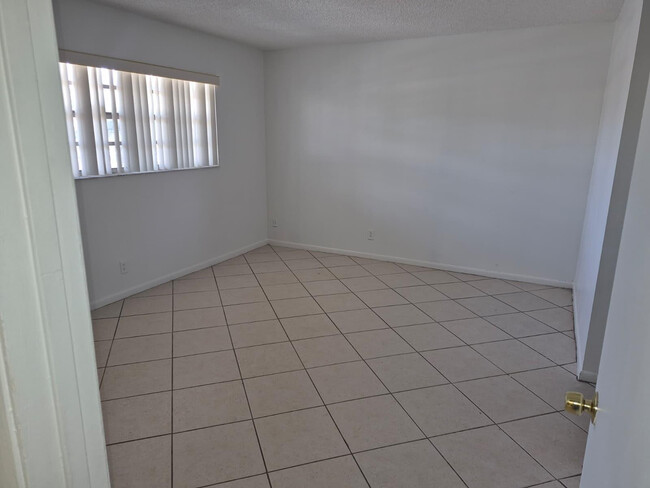Building Photo - 2966 Coral Springs Dr