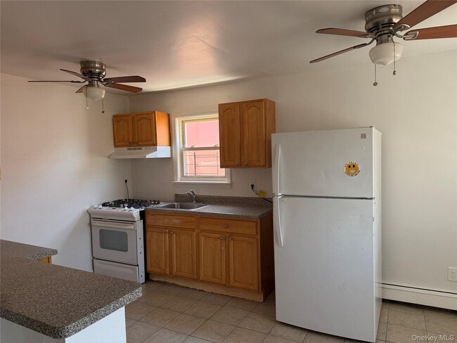 Building Photo - 69-35 De Costa Ave