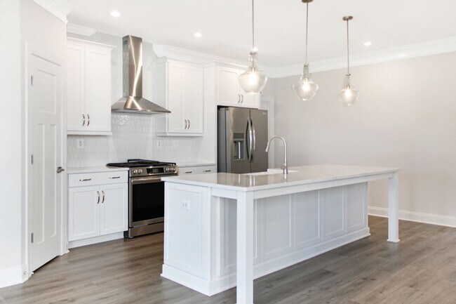 Building Photo - First-floor Primary with 2-car garage