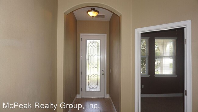 Building Photo - 4 br, 3 bath House - 6819 Park Strand Dr