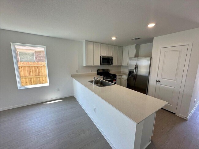 Building Photo - 6407 Begonia Trellis Dr