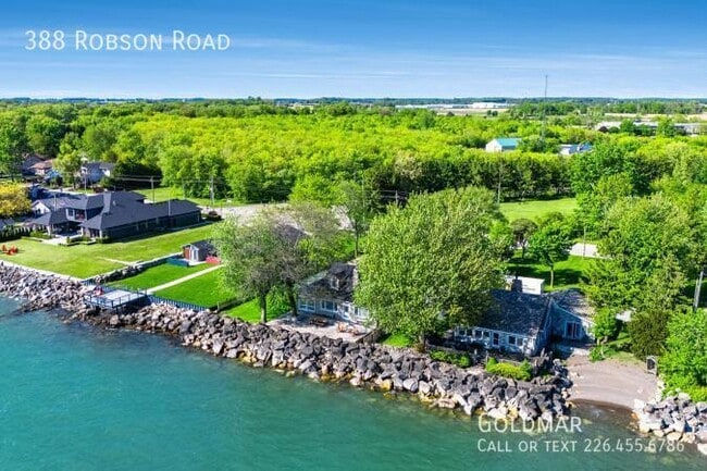 Building Photo - Stunning Short term rental on the water wi...