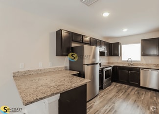 Building Photo - 9313 N Travis Dr