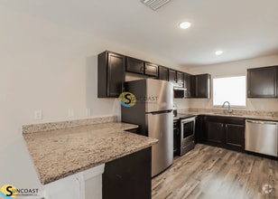 Building Photo - 9313 N Travis Dr