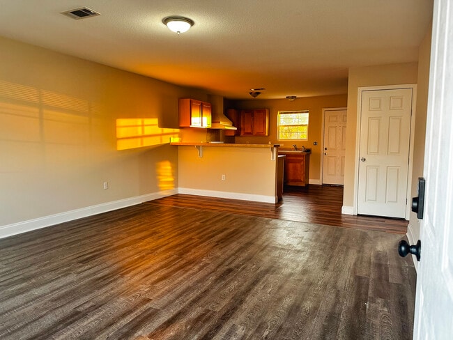 Living Room View into Kitchen - 123 Meadows Ln