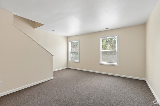 Townhome 2BR, 1.5BA - Living Room - College Hill Apartments