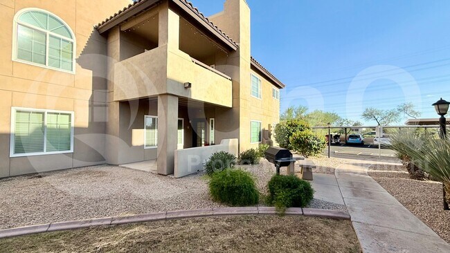 Building Photo - 9451 E Becker Ln