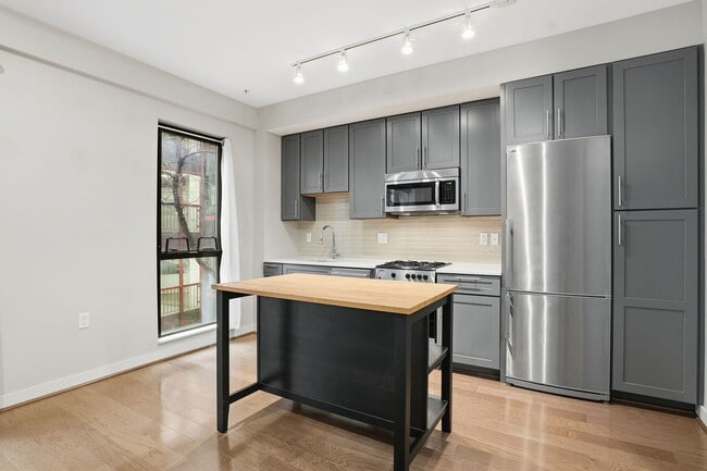 Photo - Modern 1BR Condo Steps to Metro, Parks & New Rec Center!